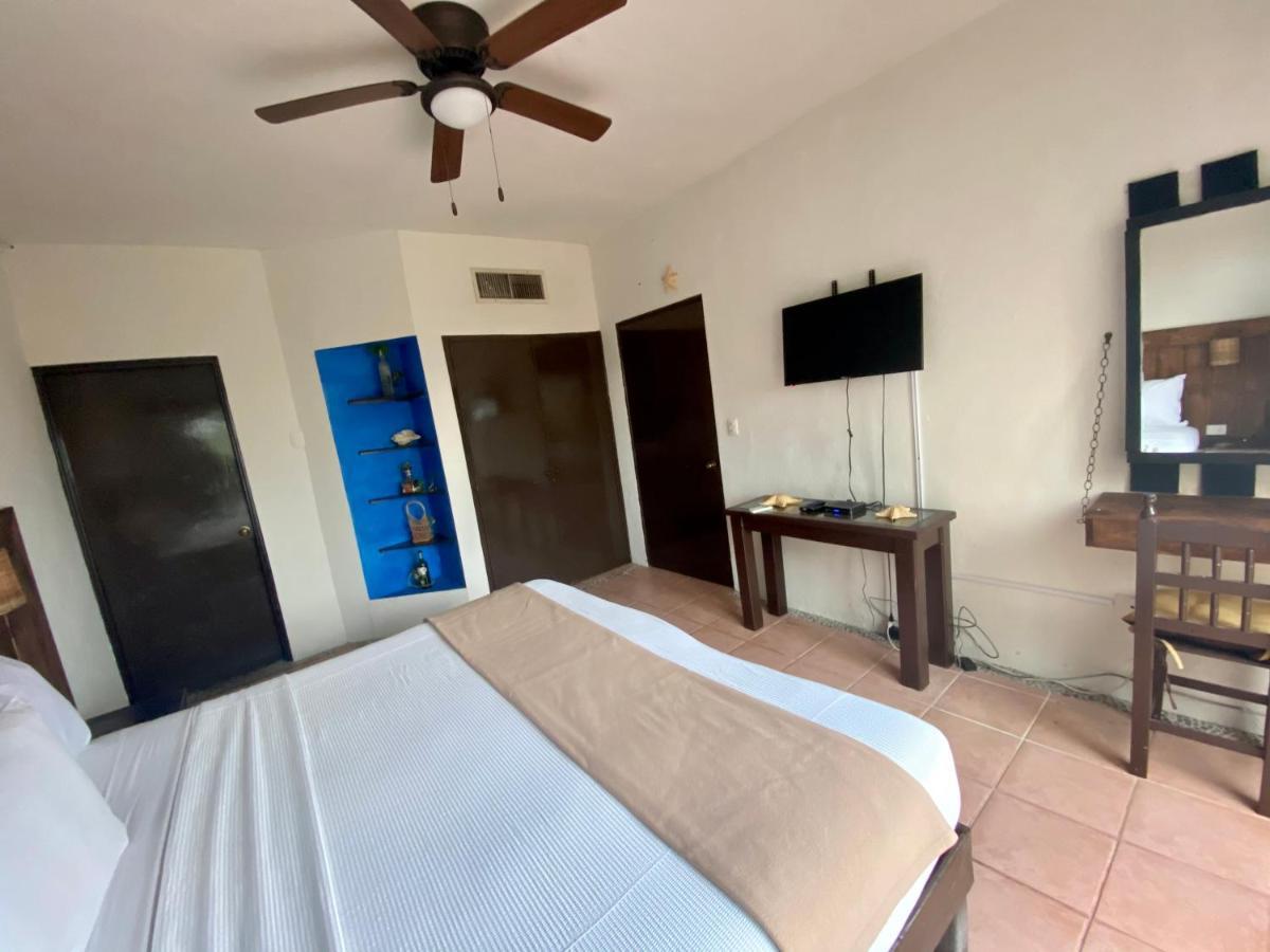 Casa Caribe Cancun Bagian luar foto A bedroom at the hotel