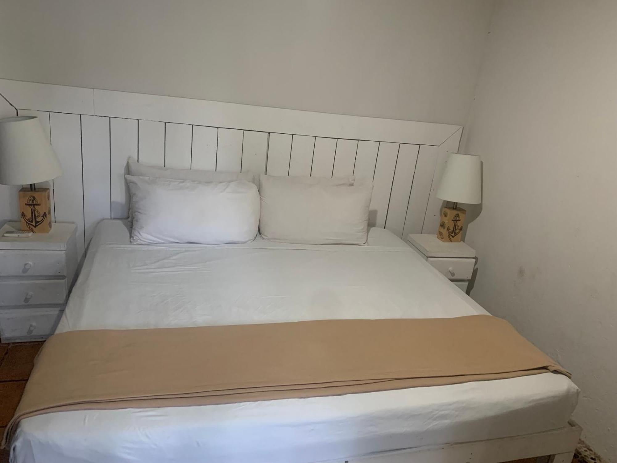 Casa Caribe Cancun Bagian luar foto A bed