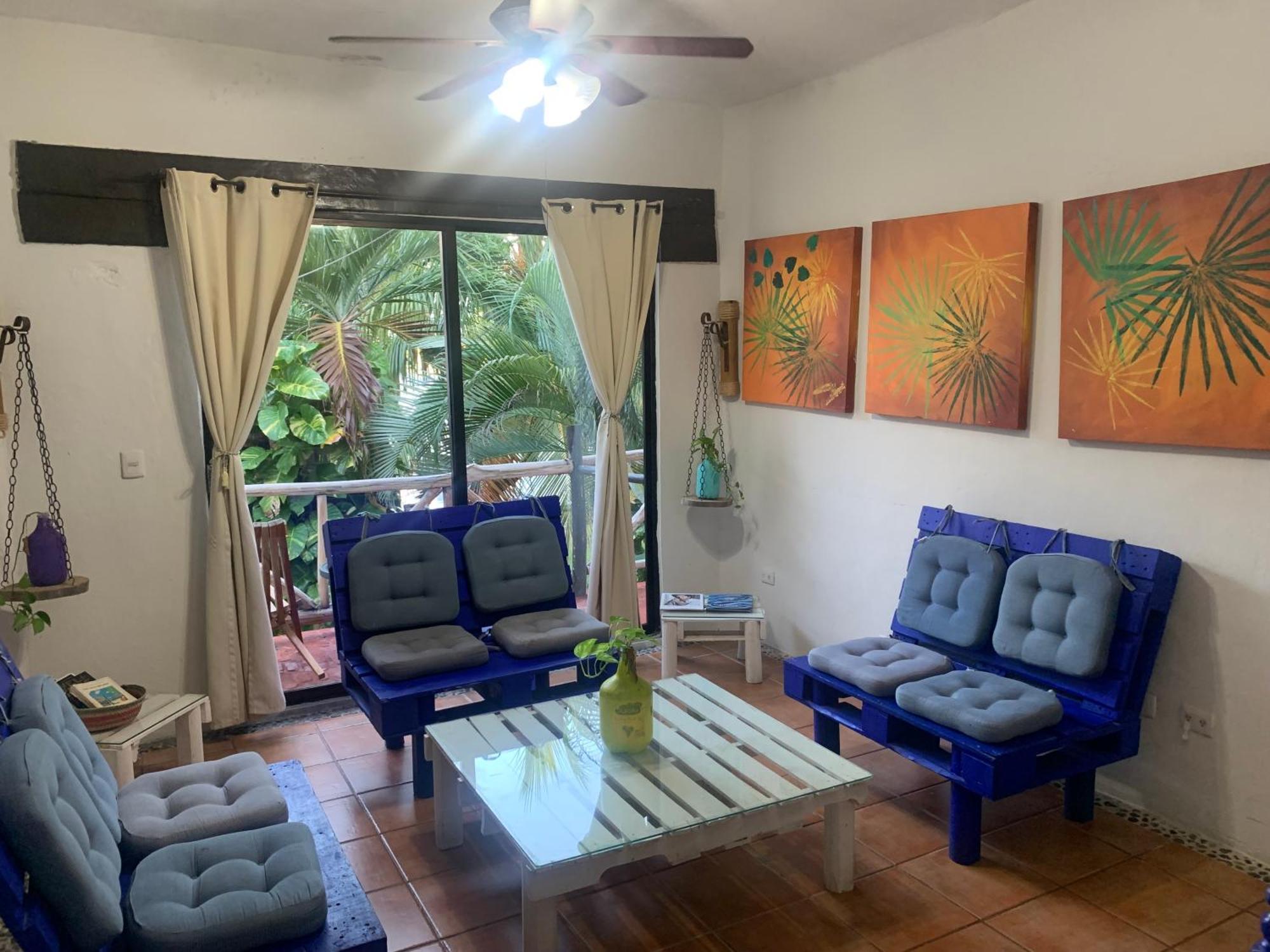 Casa Caribe Cancun Bagian luar foto Living room with a view of the ocean